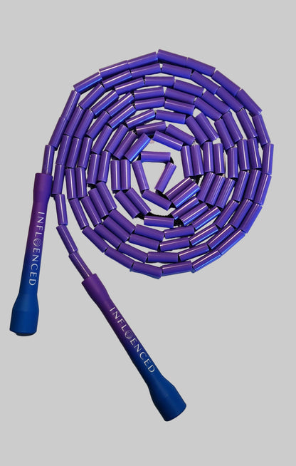 flat lay Sour Grape purple and blue  beaded jump rope by Infloenced